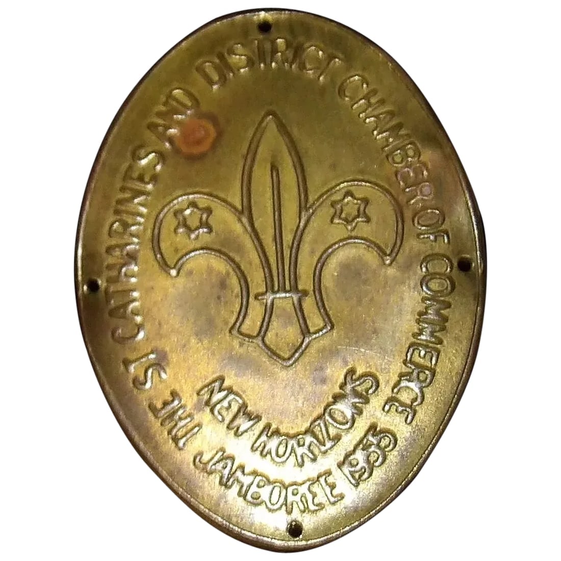 1955 8th World Jamboree Niagara Canada New Horizons Souvenir Staff Badge: A vintage scarce ORIGINAL period example of '1955 8th World Jamboree commemorative stick badge' in the form of a thin sheet metal brass oval, with four pin holes to bend round and attach to a staff, i