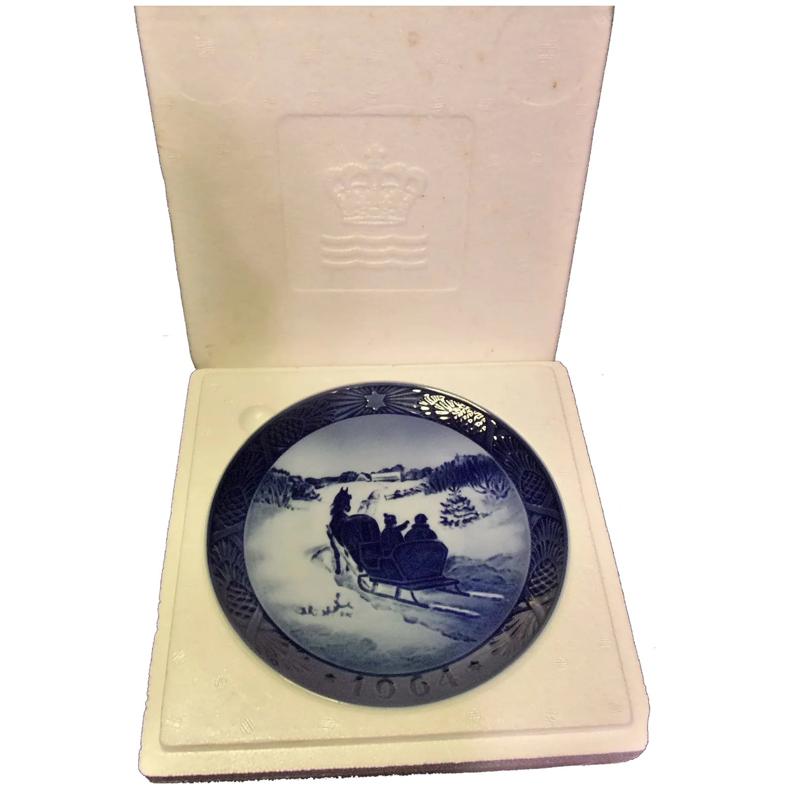 Vintage Royal Copenhagen 1964 the Christmas Tree Plate: This is one of the popular and highly collectable Christmas plates produced annually by Royal Copenhagen. The plate is dated 1964 and is called The Christmas Tree. It was designed by Kai Lange. It