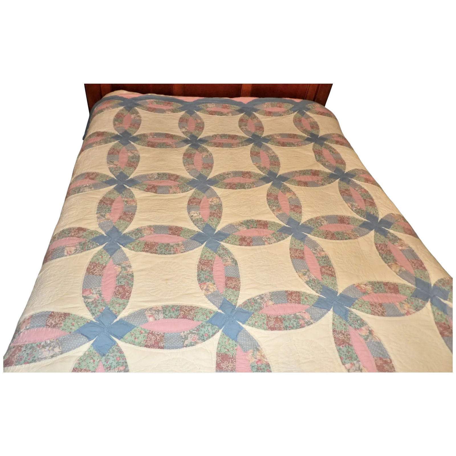 Vintage Hand Stitched Wedding Ring Quilt: This Vintage Hand Stitched Wedding Ring Quilt is large enough to fit a Queen Bed (as shown in pictures). Has one small stain on front - no other stains noted. It measures 81" x 83" and fairly lightwei