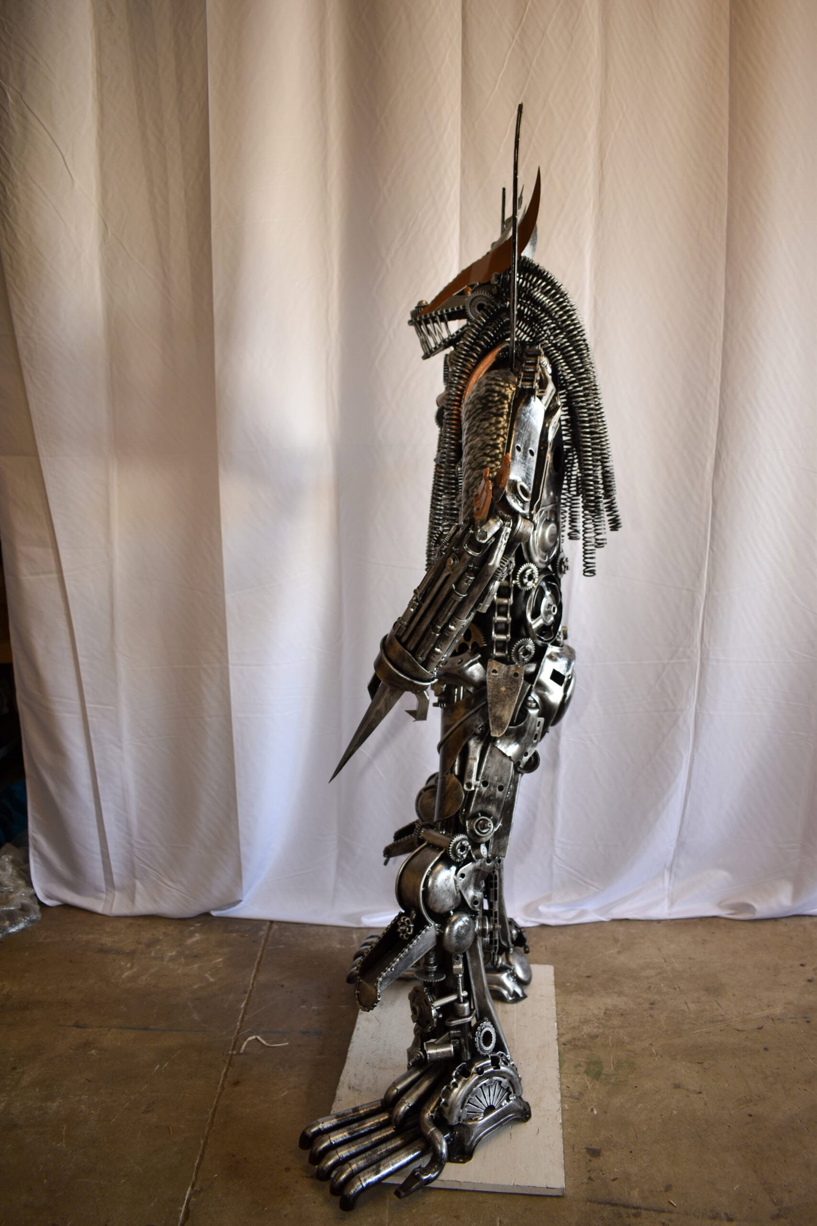 Colorfull impresive Statue of a warrier made of metal scraps 48" x 20" x 82"H - 7