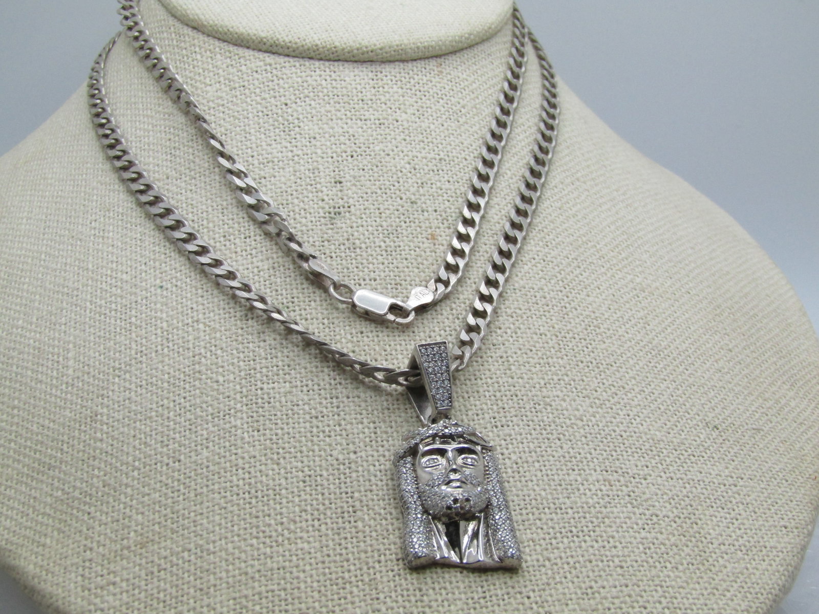 Vintage Sterling and Rhinestone Jesus Necklace, 28": Title: Vintage Sterling and Rhinestone Jesus Necklace, 28" Description: Vintage Sterling and Rhinestone Jesus Necklace, 28" curb/Cuban link that is appx. 4mm wide and marked Italy .925. The pendant