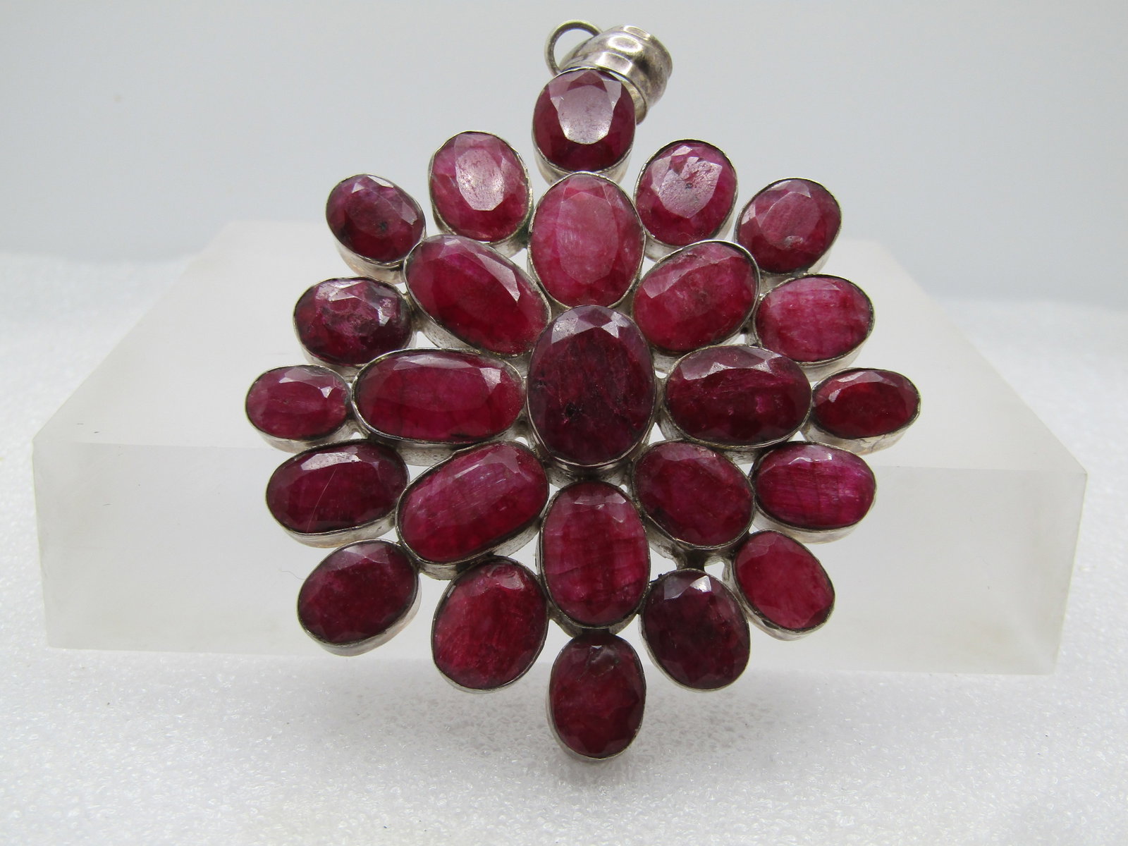 Vintage Sterling Natural Ruby Cluster Pendant, 3.25" , 1980-1990's: Title: Vintage Sterling Natural Ruby Cluster Pendant, 3.25" , 1980-1990's Description: Vintage Sterling Ruby Cluster Pendant, 3.25" , 1980's-1990's. This has twenty-five oval rubies in slightly differ