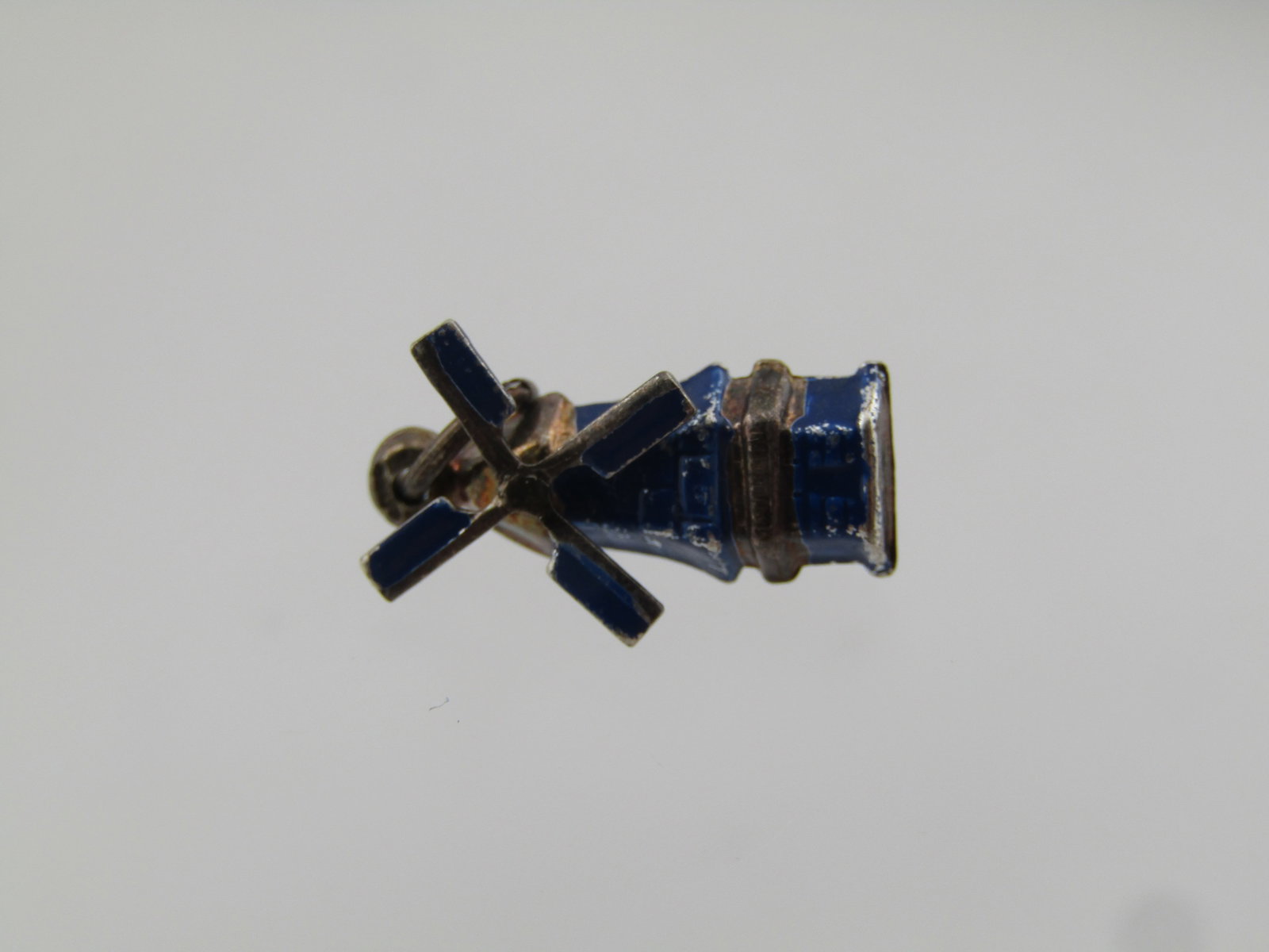 Vintage Sterling and Enameled Windmill Charm/Pendant, Mid-Century: Title: Vintage Sterling and Enameled Windmill Charm/Pendant, Mid-Century Description: Vintage Sterling and Enameled Windmill Charm/Pendant, Mid-Century, .85 grams. This is appx. 3/4" tall and 5/8" wid