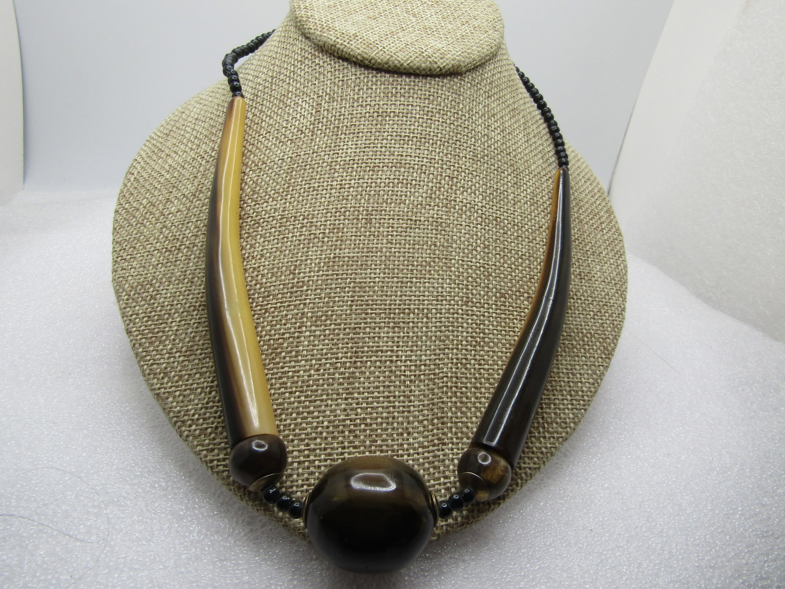Vintage Tribal Horn Beaded Necklace, 21", 1960's-1970's: Title: Vintage Tribal Horn Beaded Necklace, 21", 1960's-1970's Description: Vintage Tribal Horn Beaded Necklace, 21", 1960's-1970's. Black beads at the back of the neck that are appx. 3.5mm. The long