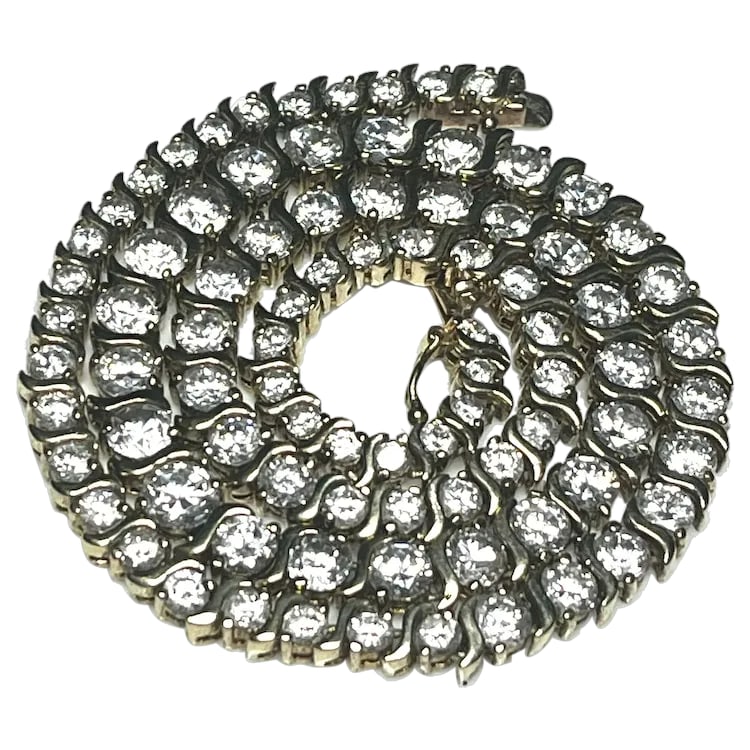 Estate Sterling Silver Gold Plated Graduated Tennis Necklace: Title: Estate Sterling Silver Gold Plated Graduated Tennis Necklace Description: Estate Sterling Silver Gold Plated Graduated Tennis Necklace . Hallmarked- CL 925. Graduated . Weighs 40.7 grams.