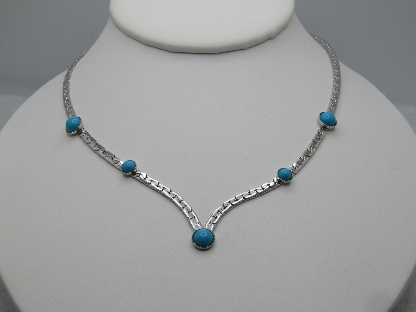 Vintage Faux Turquoise V Drop Necklace 16", Silver Tone, Southwestern Vibe. 1980's-1990's: Title: Vintage Faux Turquoise V Drop Necklace 16", Silver Tone, Southwestern Vibe. 1980's-1990's Description: Vintage Faux Turquoise V Drop Necklace 16", Silver Tone, Southwestern vibe -