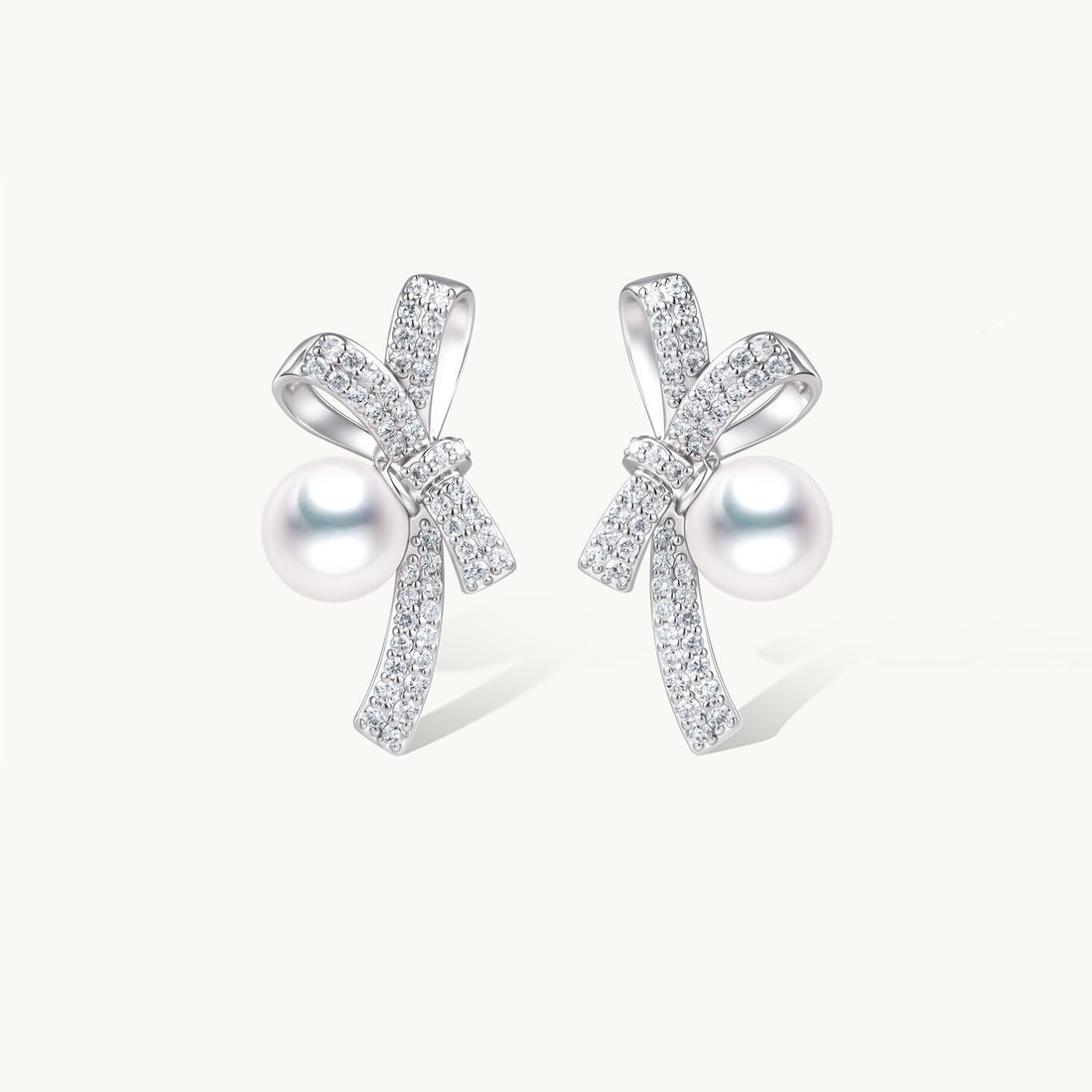 18K Gold AKOYA Seawater Pearl Earrings: Title: 18K Gold AKOYA Seawater Pearl Earrings Description: These earrings are meticulously set in 18K gold, featuring AKOYA seawater pearls that exude elegance and nobility. The lustrous pearls