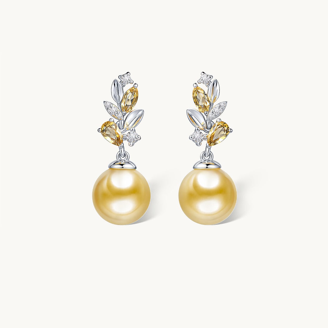 S925 Silver Yellow Crystal South Sea Golden Pearl Earrings: Title: S925 Silver Yellow Crystal South Sea Golden Pearl Earrings Description: These earrings are meticulously set in S925 silver, featuring yellow crystal and South Sea golden pearls, showcasing a