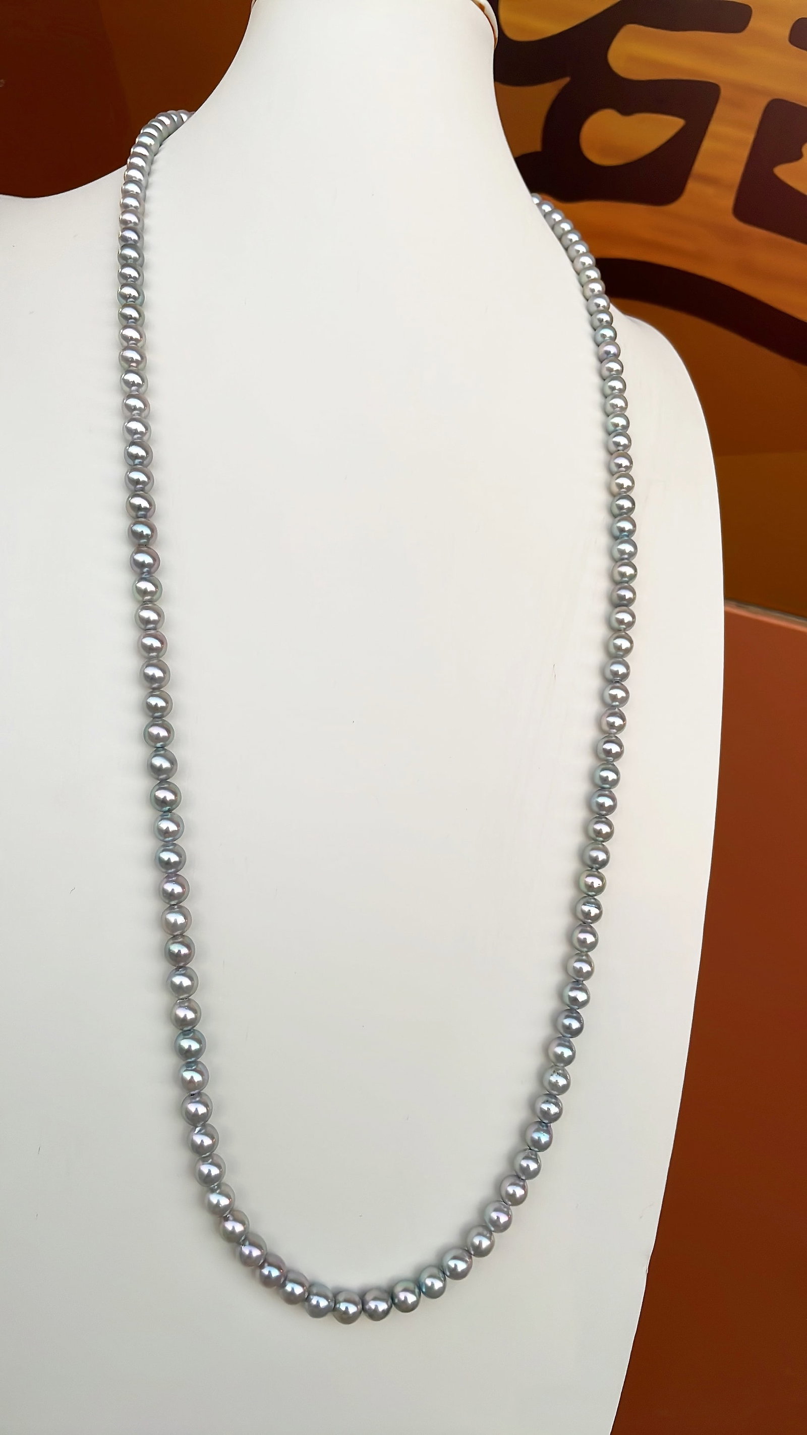 Natural Strong Luster Madama Sweater Necklace: Title: Natural Strong Luster Madama Sweater Necklace Description: This natural Madama sweater necklace showcases a strong luster and a subtle iridescent glow. The beads are nearly round, measuring 6