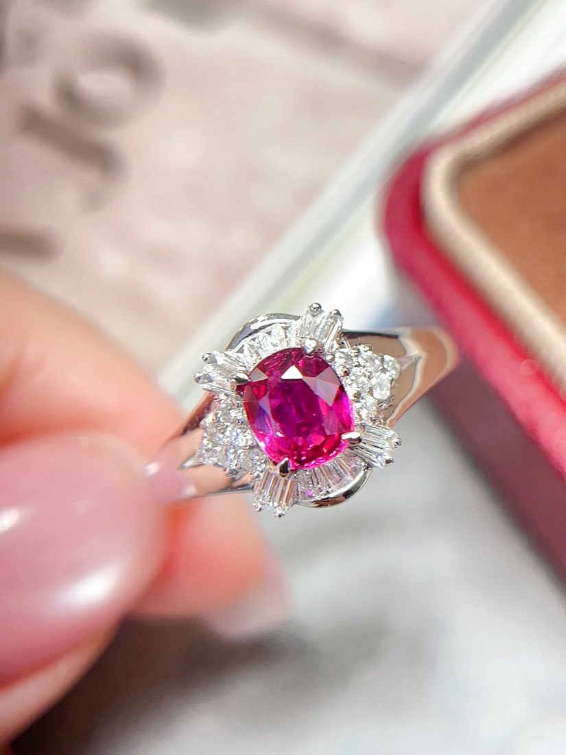 18K Gold Natural Unheated Ruby Ring: Title: 18K Gold Natural Unheated Ruby Ring Description: This ring is crafted in 18K gold, featuring a natural unheated ruby with a glass-like clarity and brilliance. The vivid color of the ruby is