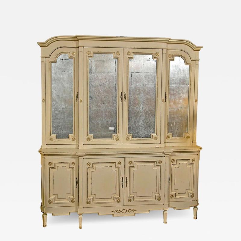 Maison Jansen Ivory Distress Painted Gilt Gold Decorated Bookcase / Cabinet: Title: Maison Jansen Ivory Distress Painted Gilt Gold Decorated Bookcase / Cabinet Description 1: A charming ivory distress-painted gilt gold decorated bookcase, circa 1950s, the molded top over a fou
