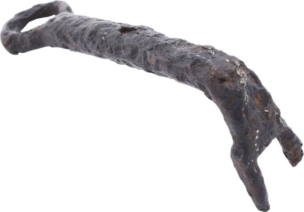 MEDIEVAL EUROPEAN DOOR KEY: Style which evolved directly from the Roman, suggesting a Byzantine origin, about 500-800 AD. Forged iron, 3 3/4" length with a round shaft with toothed terminal folded over forming a narrow slot whic