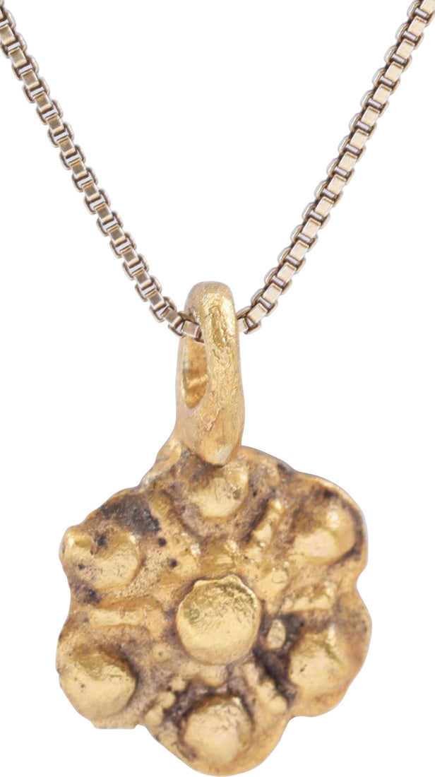 ROMAN WHEEL OF FORTUNE AMULET NECKLACE, 3RD-6TH CENTURY AD: 3rd-6th Century. Just over 1/2" (0.52") width. Raised central hub with six radials forming loops. This form which stylizes the wheel is likely influenced by the introduction of Christianity which blen