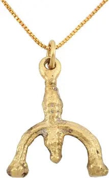 VIKING LUNAR PENDANT NECKLACE C.900-1000 AD JEWELRY.: Gilt bronze. As expert navigators, the constellations signified mystery and power to Vikings. Lunar pendants were worn as pectorals as well as suspended from belts, other clothing and horse