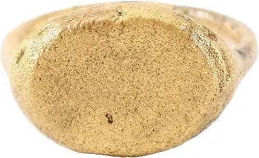 RARE VIKING WARRIOR'S RING, 10th-11th CENTURY AD, SZ 8: Rounded face, 2.8mm width, flaring at the shoulders. Size 8. Large stepped oval bezel, possibly inscribed originally, now obscured by wear and surface texture from burial. Stirrup shaped band.