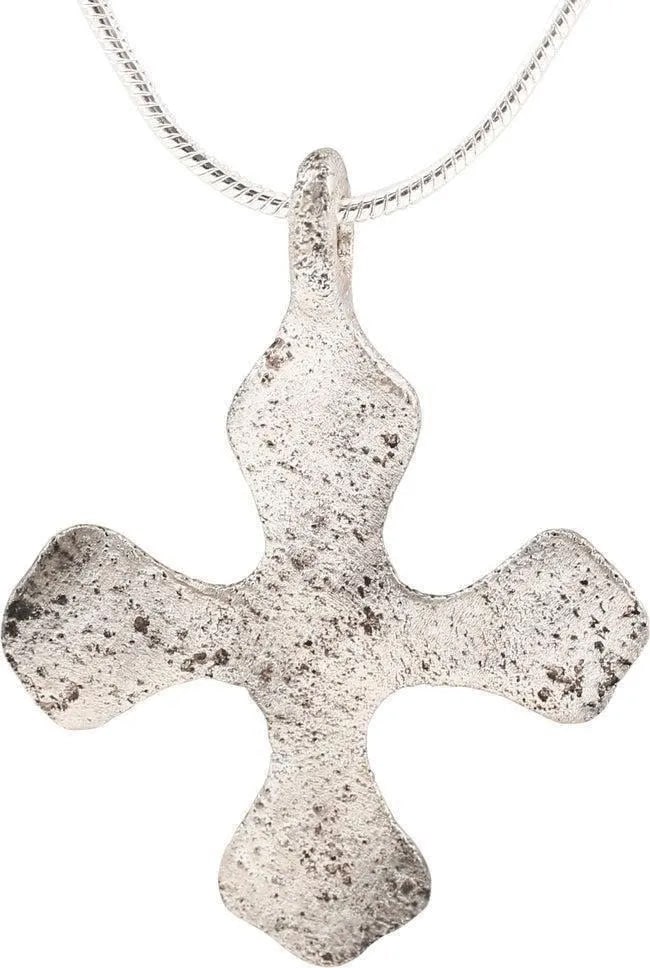 RARE MEDIEVAL CROSS NECKLACE, 13TH-15TH C.: Silvered bronze, an elegant example over 1 3/8" height with the cross beam centered and each beam expanding toward the trilobate ends. That form was later modified to become the Maltese Cross of the