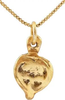 VIKING HEART PENDANT NECKLACE, C. 1000 AD: Gilt bronze. Over 5/8" in height. Made by the open face mold technique. Iconic heart forms with broad double edges scrolling inward forming foliage in trefoil form. The heart stood for bravery,
