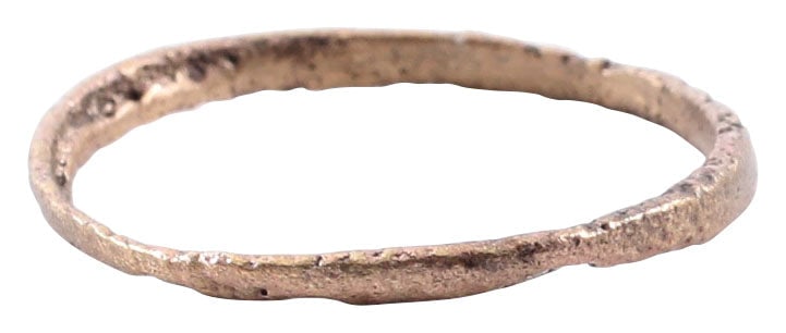 VIKING WARRIOR'S BEARD RING, 9th-11th CENTURY AD: Gilt bronze, round with low rounded face 1.5mm in thickness, 0.64" inner diameter, 0.68" outer. The use of beard rings by Vikings is well documented though very few genuine examples survive.
