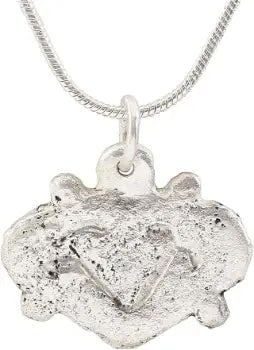 VIKING HEART PENDANT NECKLACE 850-950 AD: Just under 3/4" height including the loop. Made by the open face mold method. Heart form with scroll shoulders and of the low rounded section, with nubs at the quarter points defining a saltire. The f