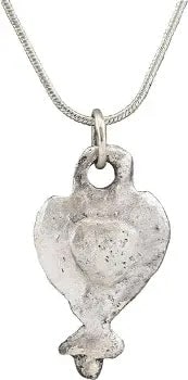 SCANDINAVIAN WOMAN'S PENDANT NECKLACE, 12th-14th CENTURY: Baroque ornamentation embracing the Viking heritage. The form evolved from the traditional heart pendants retaining the pointed bottom, here crossed in recognition of conversion to Christianity and cu