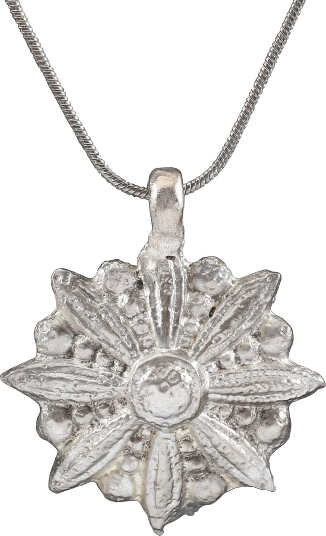 ROMAN WHEEL OF FORTUNE AMULET NECKLACE, 3RD-6TH CENTURY AD: The Wheel of Fortune (Rota Fortuna) is one of the most enduring of ancient philosophical or religious concepts. It was pivotal in Ancient Greek and Roman Paganism and smoothly transitioned into Christ