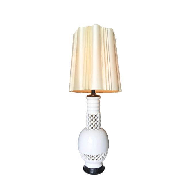 Large Mid Century Ceramic "Infinity" Table Lamp W/ Shade by James Mont: Title: Large Mid Century Ceramic "Infinity" Table Lamp W/ Shade by James Mont Description: Large Mid Century white ceramic "Infinity" table lamp featuring repeating infinity pattern with a ripped neck
