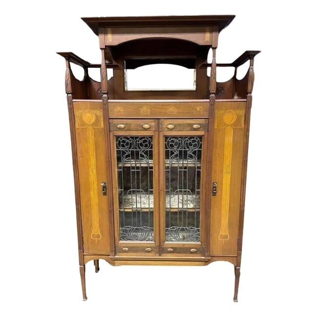 Antique Art Nouveau Mahogany and Floral Marquetry Display Cabinet: Title: Antique Art Nouveau Mahogany and Floral Marquetry Display Cabinet Description: This magnificent Art Nouveau light-up display cabinet showcases exquisite Gall√©-style marquetry with f