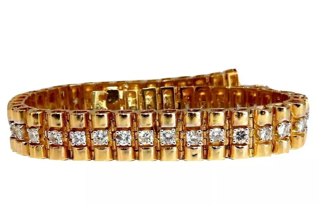 3.30ct natural round diamonds tubular wide bracelet 14 karat 9.4mm**: 3D wide tubular link bracelet 3.30 carat natural round diamonds link bracelet. G color vs2 clarity. 14 karat yellow gold 38 grams Bracelet measures 8-in long 9.4mm wide 4.1 mm depth $18,000 appraisal