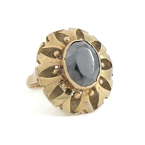Vintage 1940's Oval Hematite Filigree Cocktail Ring 16K Yellow Gold, 3.06 Grams: Vintage 1940's Oval Hematite Filigree Cocktail Ring 16K Yellow Gold, 3.06 Grams This is such a lovely and unique ring! Please let us know if you have any questions. Circa: 1940's Gemstones: one oval h