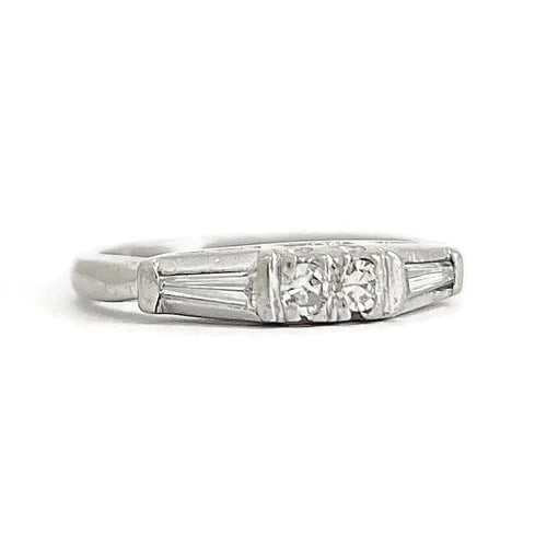 Vintage 1940's 2-Stone Diamond Engagement Ring Platinum, .18 CTW, 3.33 Grams: Vintage 1940's 2-Stone Diamond Engagement Ring Platinum, .18 CTW, 3.33 Grams This ring is a beautiful and unique ring! Please let us know if you have any questions. Circa: 1940's Diamonds: 2 round sin
