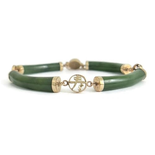 Vintage 1970's Green Jade Chinese Symbol Bracelet 10K Yellow Gold, 17.12 Grams: Vintage 1970's Green Jade Chinese Symbol Bracelet 10K Yellow Gold, 17.12 Grams The symbols on the bracelet stand for luck, money, longevity and fulfillment. Please let us know if you have any question