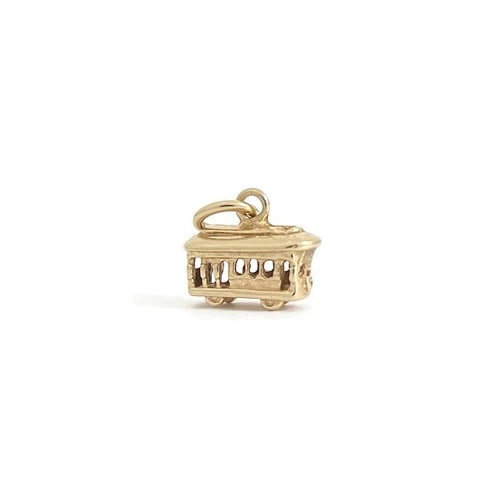 Vintage San Francisco Trolly Car Charm 14K Yellow Gold, 1.81 Grams: Vintage San Francisco Trolly Car Charm 14K Yellow Gold, 1.81 Grams This is a unique charm that can be worn on the necklace or bracelet chain of your choice. Please let us know if you have any