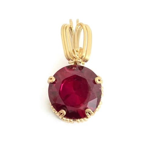 Vintage 1960's Red Gemstone Pendant 10K Yellow Gold, 4.78 Grams: Vintage 1960's Red Gemstone Pendant 10K Yellow Gold, 4.78 Grams This is such a beautiful pendant. Please let us know if you have any questions. Gemstone: 1 round simulated red gemstone Metal: 10K