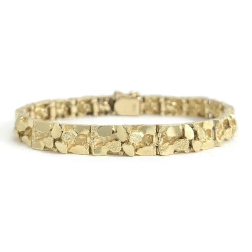 Vintage 1970's Men's Nugget Bracelet 14K Yellow Gold, 7 Inches, 25.86 Grams: Vintage 1970's Men's Nugget Bracelet 14K Yellow Gold, 7 Inches, 25.86 Grams This is a unique vintage bracelet! Please do not hesitate to ask any questions. Metal: 14K yellow gold Weight: 25.86 grams S