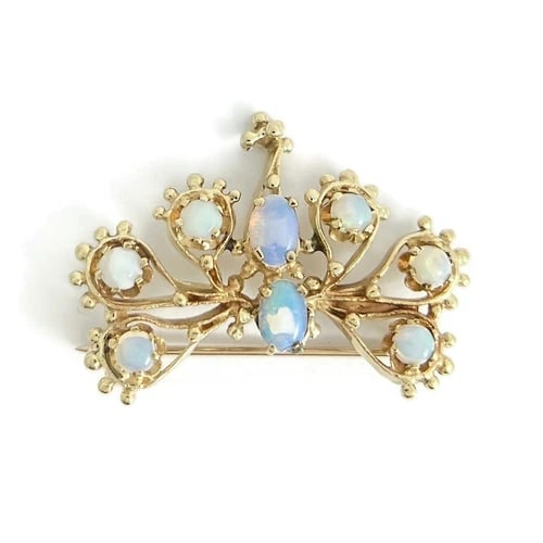 Vintage 1950's Opal Peacock Bird Brooch Pin 12K Yellow Gold, 5.65 Gr: Vintage 1950's Opal Peacock Bird Brooch Pin 12K Yellow Gold, 5.65 Gr This is a gorgeous one-of-a-kind brooch. Please let us know if you have any questions. Circa: 1950's Gemstones: 2 oval cabochon opa