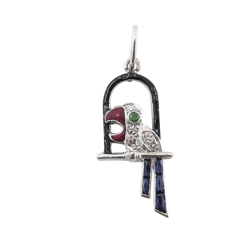 Antique Platinum Parrot Charm Gemstone Diamond Accents: Title: Antique Platinum Parrot Charm Gemstone Diamond Accents Description: ES TTO Product details: MATERIALS: Platinum, Enamel GEMSTONE: Diamond WEIGHT: 1.9 Grams MEASUREMENTS: 1/4" x 3/4" ITEM DETAIL