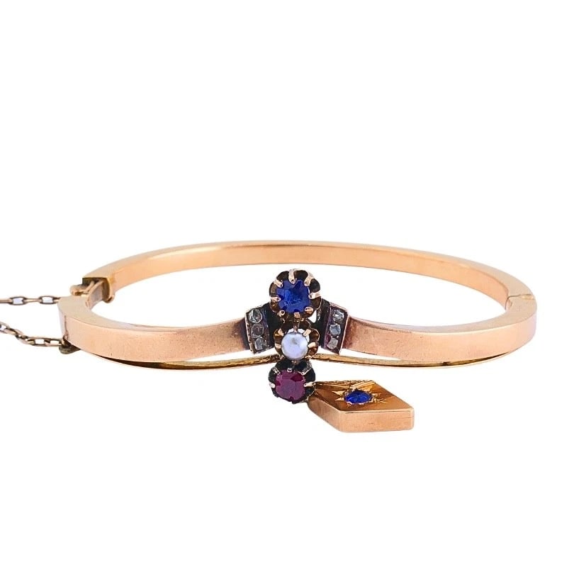 Victorian 14k Gold Gemstone Bangle Bracelet: Title: Victorian 14k Gold Gemstone Bangle Bracelet Description: ES JNOO Product details: CIRCA: Late 19th Century MATERIALS: 14k Gold GEMSTONE: Diamond WEIGHT: 15 Grams MEASUREMENTS: Inner circumferen
