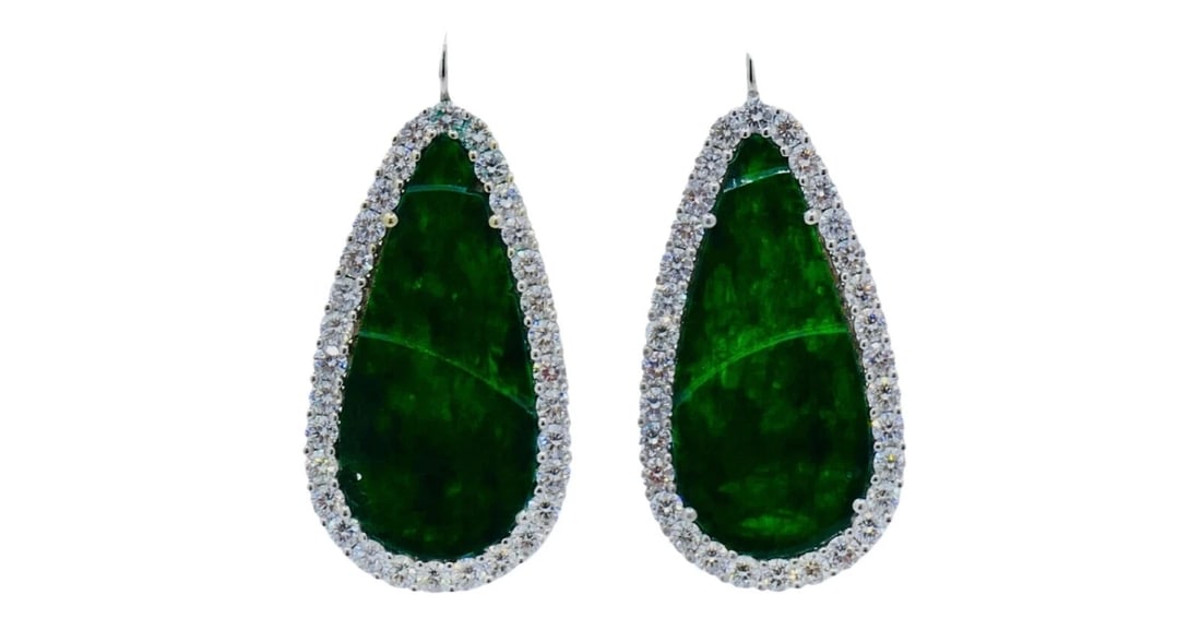 Carved Jadeite Diamond Earrings 18k White Gold: Title: Carved Jadeite Diamond Earrings 18k White Gold Description: ES NTOO Product details: DESIGNER: Unknown CIRCA: 1960's MATERIALS: Rhodium-Plated 18K White Gold GEMSTONE: Carved Jadeite, Diamond W