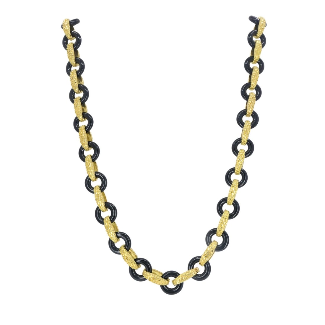 Vintage Tiffany & Co. 18k Gold Onyx Necklace: Title: Vintage Tiffany & Co. 18k Gold Onyx Necklace Description: KL JEOOO This Tiffany & Co. onyx and 18k gold necklace reflects the bold, sculptural aesthetic the house favored in the late 1970s thro