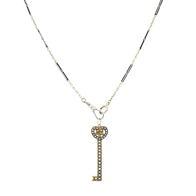 14k Gold Key Pendant Necklace Pearls and Black Enamel: Title: 14k Gold Key Pendant Necklace Pearls and Black Enamel Description: ES JAOO Product details: DESIGNER: Unknown MATERIALS: 14k Gold, Enamel WEIGHT: 9.6 Grams MEASUREMENTS: Pendant - 1/2" x 1 1/2"
