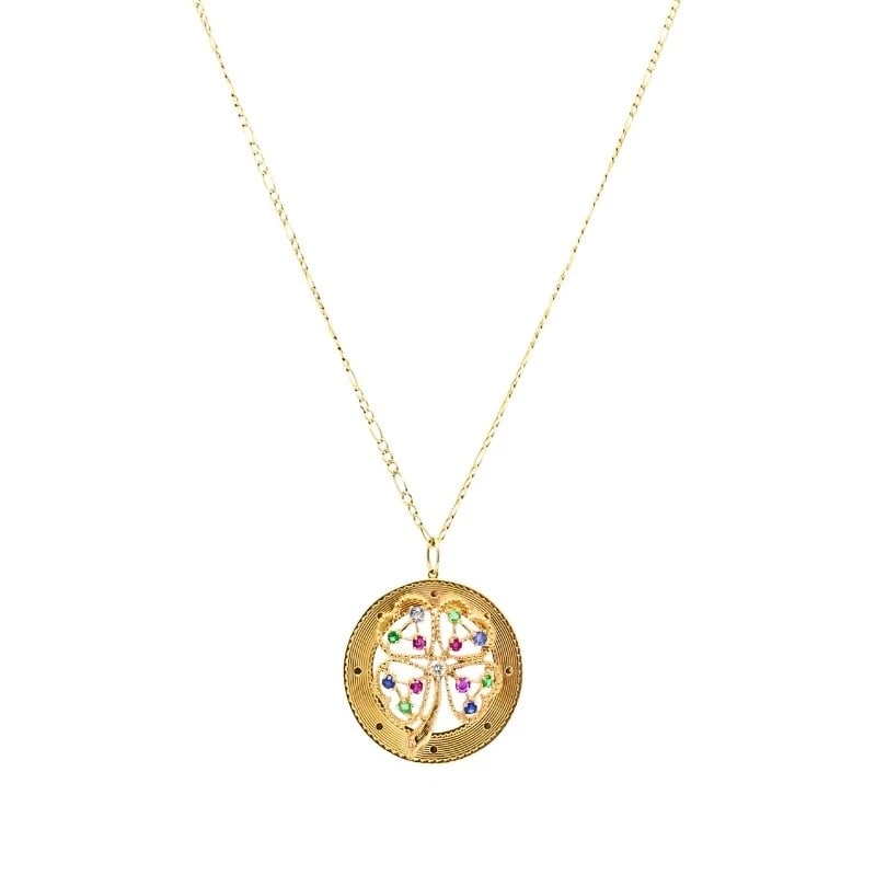 14K Gold Gemstones Clover Pendant Necklace: Title: 14K Gold Gemstones Clover Pendant Necklace Description: ES JEOO Product details: DESIGNER: Unknown CIRCA: Late 20th Century MATERIALS: 14k Gold GEMSTONE: Ruby, Sapphire, Emerald, Diamond WEIGHT
