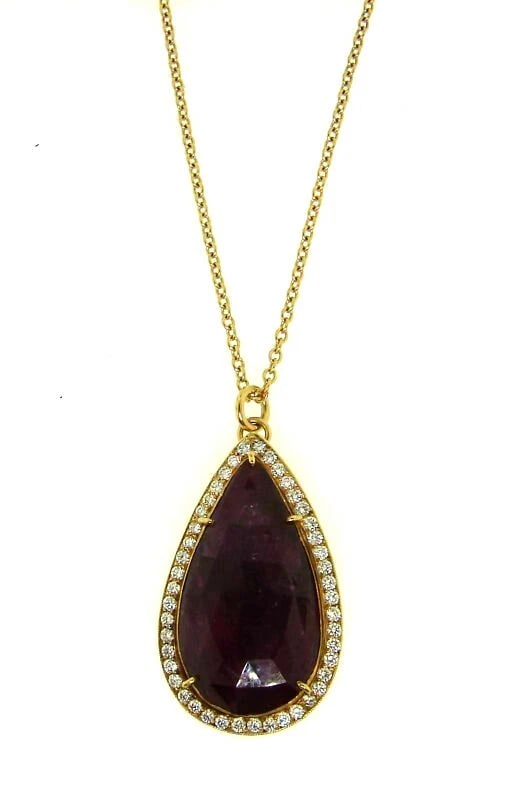 18k Yellow Gold Ruby Diamond Rain Drop Necklace: Title: 18k Yellow Gold Ruby Diamond Rain Drop Necklace Description: DK/NS TTOO 18k Yellow Gold Ruby Diamond Rain Drop Necklace The pendant has 9.50 carats of ruby. There are 0.52 carats of diamonds.