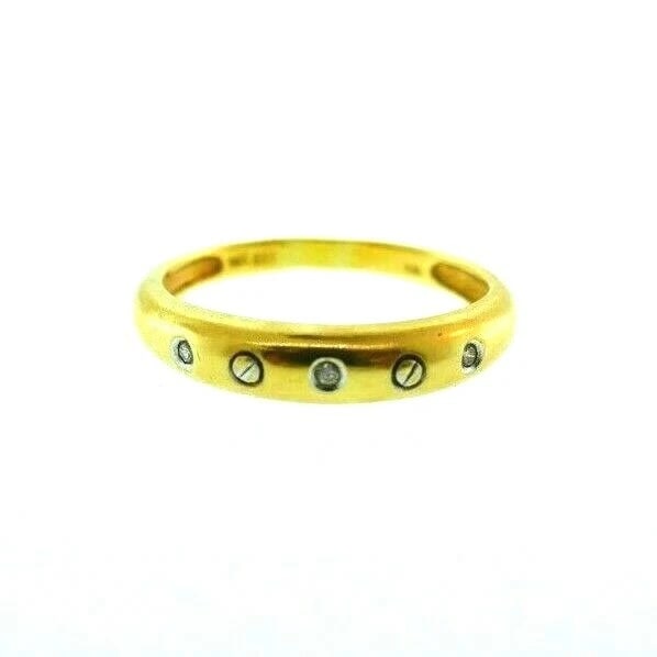 VINTAGE 14k Yellow & White Gold & Diamond Band Ring: Title: VINTAGE 14k Yellow & White Gold & Diamond Band Ring Description: DK Vintage 14k Yellow & White Gold & Diamond Band Ring ? This is a must for a collector. The weight is 2.6 grams. The width is