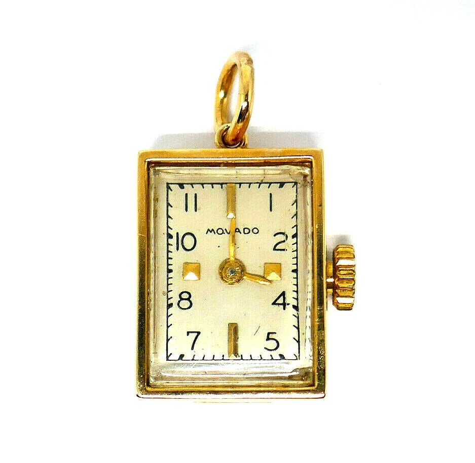 Movado Vintage Watch Pendant 10k Yellow Gold: Title: Movado Vintage Watch Pendant 10k Yellow Gold Description: NS TOO 10k Yellow Gold Movado Vintage Watch Pendant Great pendant to add to your layering collection. If you are looking to buy it as a