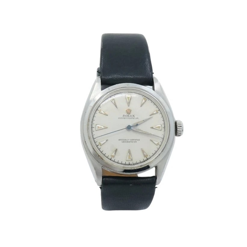 Vintage Rolex Oyster Perpetual 6084 Stainless Steel Wristwatch: Title: Vintage Rolex Oyster Perpetual 6084 Stainless Steel Wristwatch Description: NS ATOO Vintage Rolex Oyster Perpetual 6084 Stainless Steel Wristwatch Crafted in stainless steel, this vintage Rolex