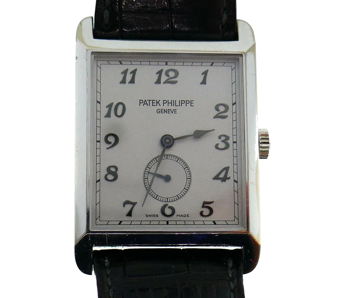 PATEK PHILIPPE White Gold Unisex WATCH BLK LEATHER STRAP Original: Title: PATEK PHILIPPE White Gold Unisex WATCH BLK LEATHER STRAP Original Description: VK JEOOO PATEK PHILIPPE 18 karat White Gold Watch Classic Patek Philippe unisex watch. Rectangular 18 karat white 