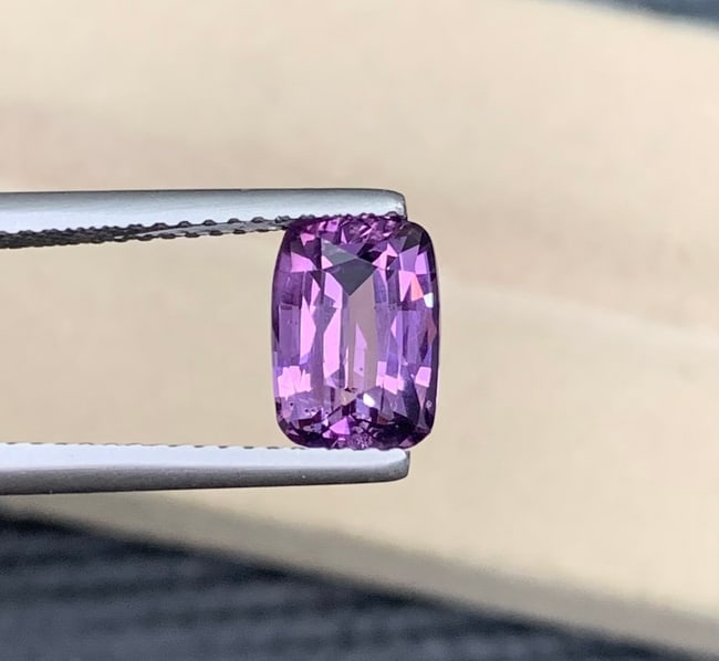 2.04 Carat AIG Certified No Heat Natural Spinel Gemstonr From Tanzania: Title: 2.04 Carat AIG Certified No Heat Natural Spinel Gemstonr From Tanzania Description: Spinel Details: * Shape : Cushion Cut * Colour : Purple * Origin : Tanzania * Lustre: Vitreous * Treatment: