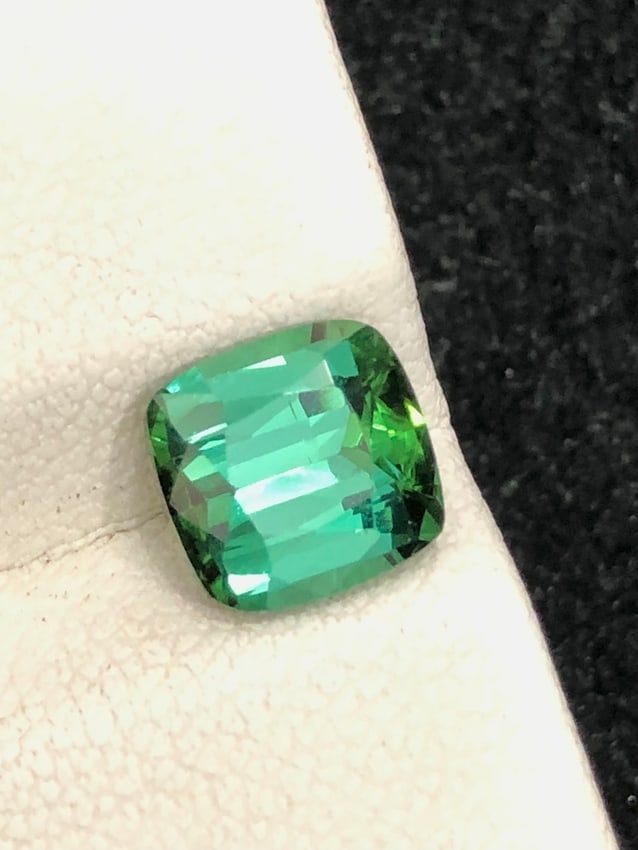 2.25 Carats Natural Bluish Green Afghani Tourmaline Gemstone: Title: 2.25 Carats Natural Bluish Green Afghani Tourmaline Gemstone Description: Tourmaline Details: * Weight : 2.25 carat * Dimension : 7.7 x 7.5 x 5 MM * Shape : Cushion Cut * Colour : Green * Clari