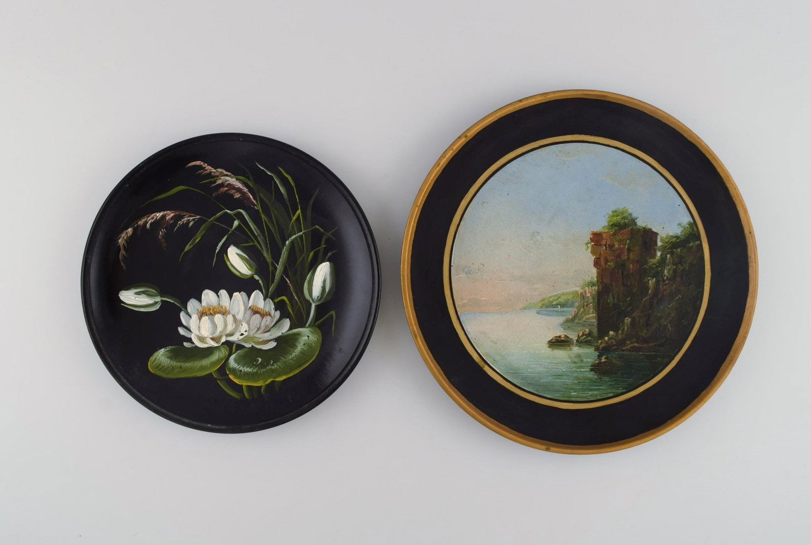 Two antique Hjorth decorative plates in hand-painted teracotta. Late 19th century. - 2