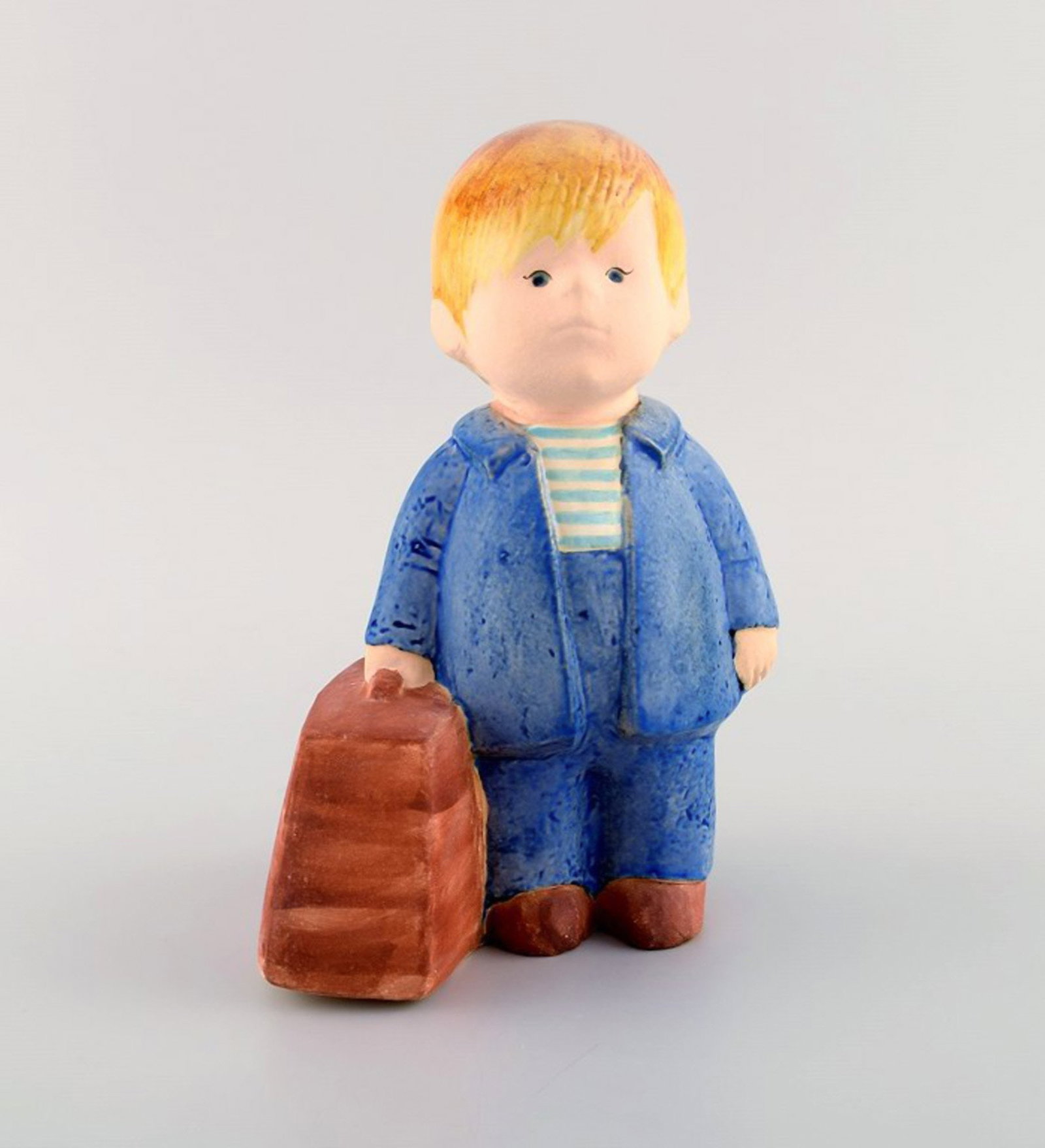Lisa Larson for Gustavsberg. Rare figure in glazed ceramics. Boy with bag. 1970 / 80s. - 2
